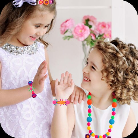 Sisters wearing Orian pop beads jewelry